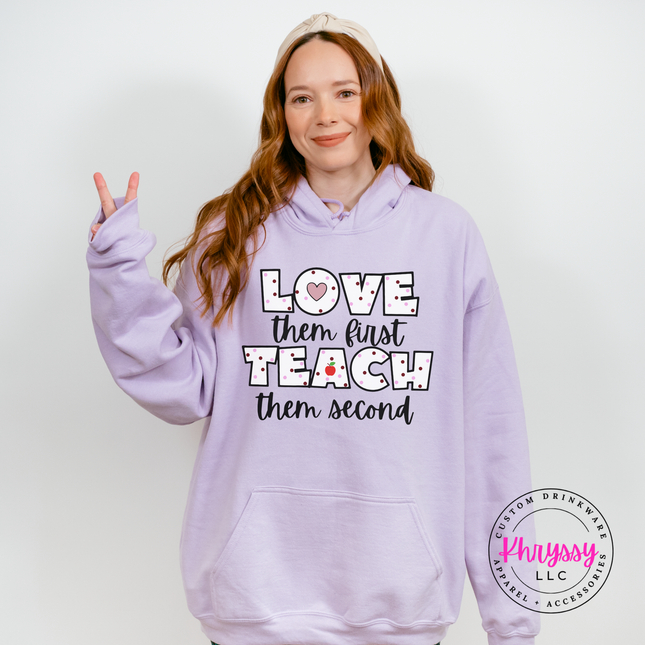 Bold contrast love them first teach them second hoodie on Orchid
Gildan with cream polka dot lettering and apple graphic
