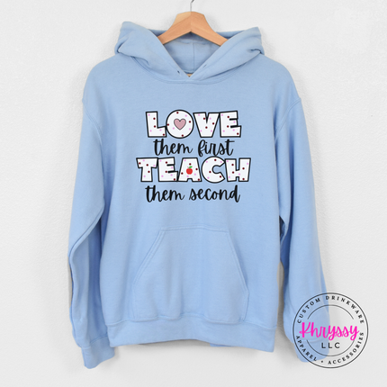 Soft Light blue Gildan hoodie with love them first teach them second black polka dot heart apple educator graphic