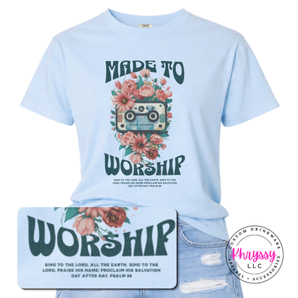 Chambray tee featuring teal worship lettering wrapped in soft coral blooms