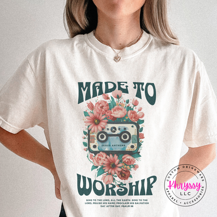 Ivory tee with a vintage cassette and floral faith graphic centered on the chest