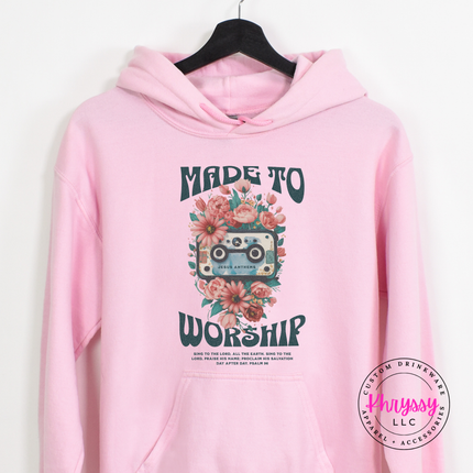 light pink hoodie with a vintage cassette and floral faith graphic