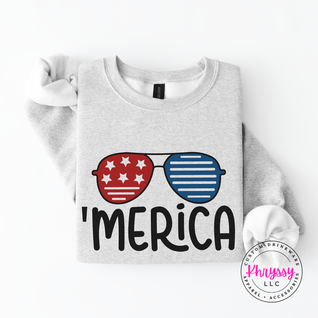 Ash crewneck sweatshirt with a retro patriotic sunglasses and Merica graphic.