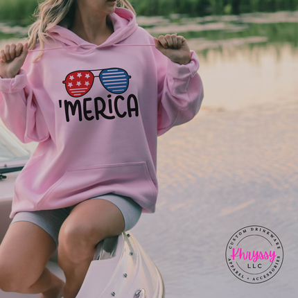 Light Pink pullover hoodie showing a star-and-stripe sunglasses graphic.