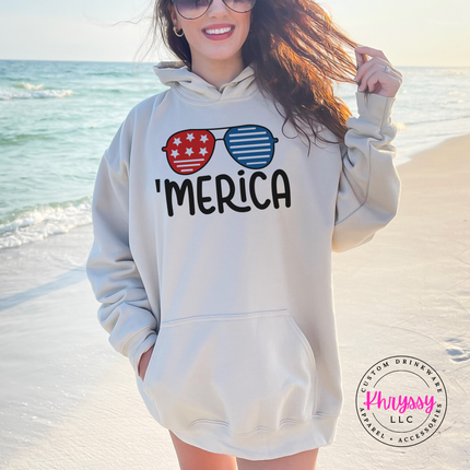 Sand pullover hoodie displaying retro patriotic shades with Merica text.