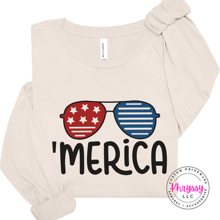 Natural long sleeve tee showing a star-and-stripe sunglasses summer graphic.