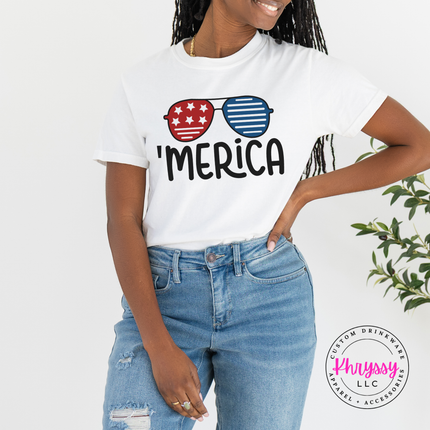 White garment-dyed tee displaying retro patriotic shades with Merica text.