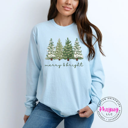 Chambray long sleeve tee styled with jeans, showing the full Christmas trees graphic.
