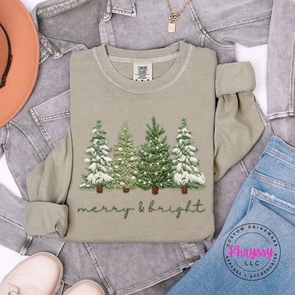 Relaxed Khaki long sleeve tee with an embroidery style Christmas trees graphic.