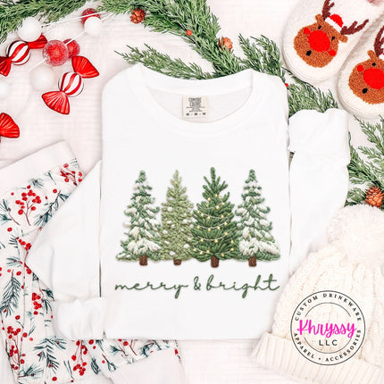 White Comfort Colors long sleeve tee featuring embroidery style evergreen trees and script.