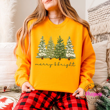 Cozy Gold crewneck sweatshirt styled with leggings, showing the full Christmas trees design.