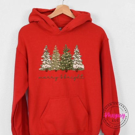 Cardinal Red hoodie with a kangaroo pocket and a snowy Christmas trees graphic.