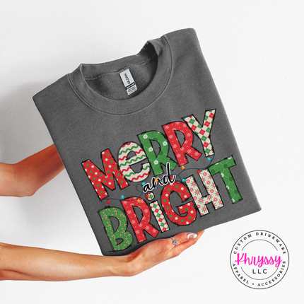 Model wearing the Merry and Bright patterned crewneck sweatshirt in Charcoal.