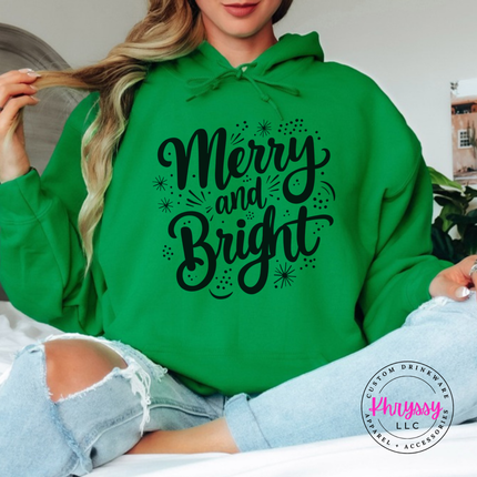 Close up of the Merry and Bright art on an Irish Green hoodie.
