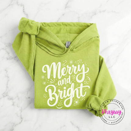 Model wearing the Merry and Bright hoodie in Safety Green.