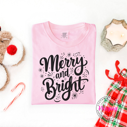Blossom tee featuring flowing Merry and Bright script lettering.