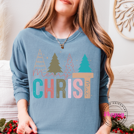 Model wearing the Merry Christ mas long sleeve tee in Blue Jean.