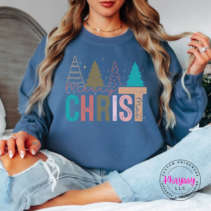 Indigo Blue crewneck sweatshirt featuring Merry Christ mas lettering and colorful trees.