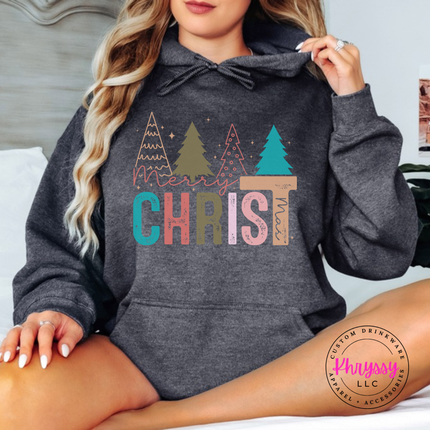 Dark Heather hoodie showing bold CHRIST letters under four Christmas trees.
