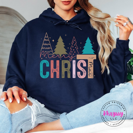 Model wearing the Merry Christ mas hoodie in Navy.
