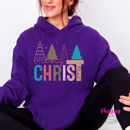 Close up of the Merry Christ mas art on a Purple hoodie.