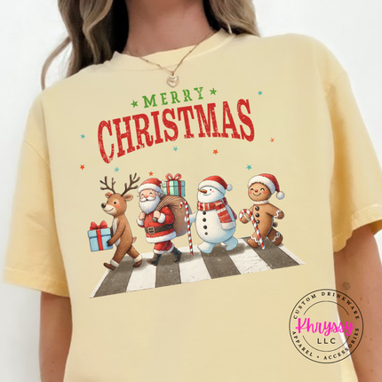 Model wearing the Christmas crosswalk tee in Butter.