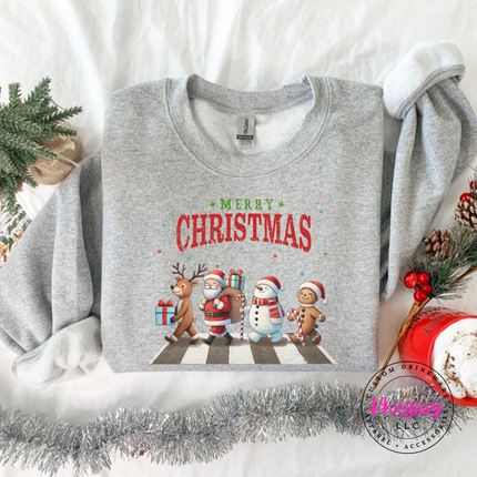 Model wearing the Christmas crosswalk crewneck sweatshirt in Sport Gray.