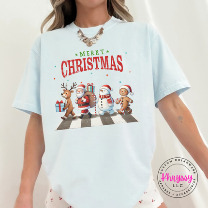 Chambray tee showing a reindeer, Santa, a snowman, and gingerbread.