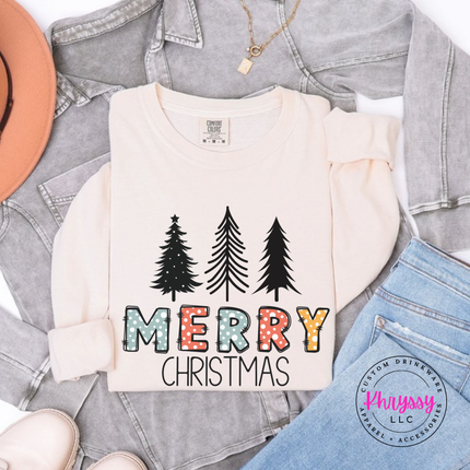 Model wearing the Merry Christmas pine long sleeve tee in Ivory.