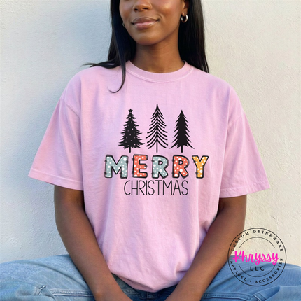 Blossom tee featuring sketched pine trees and Merry Christmas lettering.