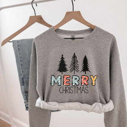 Sport Gray crewneck sweatshirt showing three pines over glittery Merry letters.