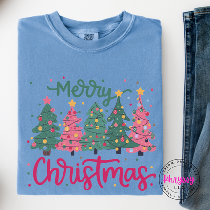 Washed Denim long sleeve tee showing a row of pink and green Christmas trees.