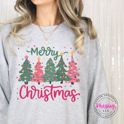 Ash crewneck sweatshirt featuring pink and green trees with Merry Christmas script.