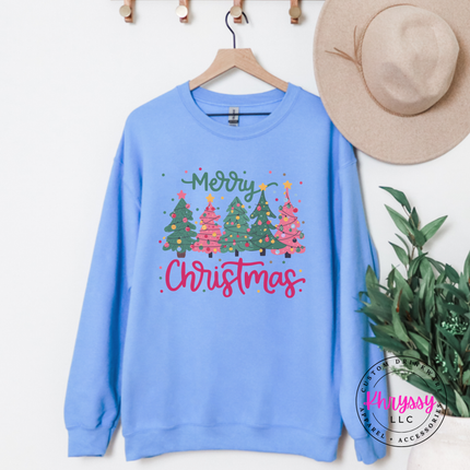 Model wearing the Merry Christmas tree crewneck sweatshirt in Carolina Blue.