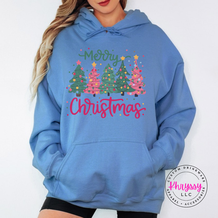 Model wearing the Merry Christmas tree hoodie in Carolina Blue.