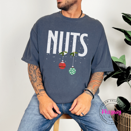 Man wearing the Nuts Christmas ornament tee in Denim.