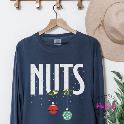 Midnight long sleeve tee with bold Nuts lettering and two hanging ornaments.
