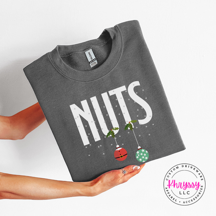 Funny Nuts Christmas ornament design printed on a Charcoal crewneck sweatshirt.