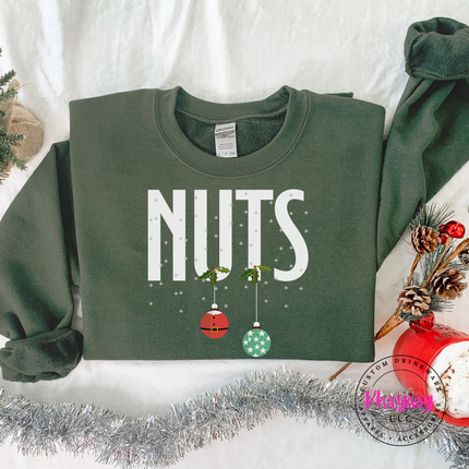 Military Green crewneck sweatshirt with bold Nuts lettering and two hanging ornaments.