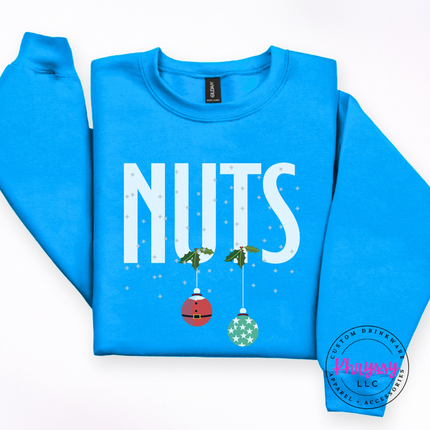 Close up of the Nuts holiday pun print on a Sapphire crewneck sweatshirt.