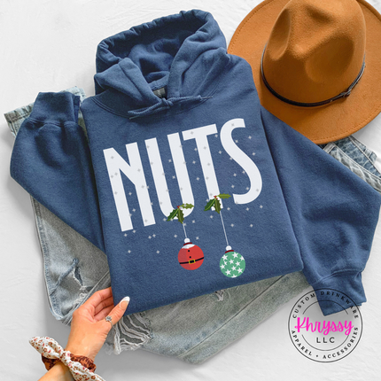 Close up of the Nuts holiday pun print on an Indigo Blue hoodie.