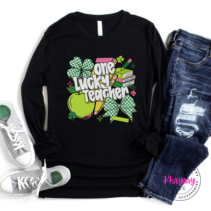 Black long sleeve tee with a colorful one lucky teacher shamrock print.