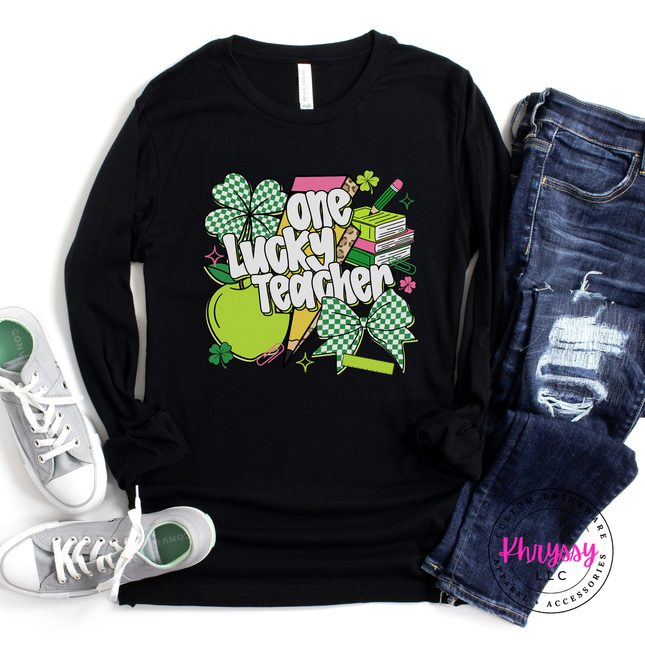Black long sleeve tee with a colorful one lucky teacher shamrock print.