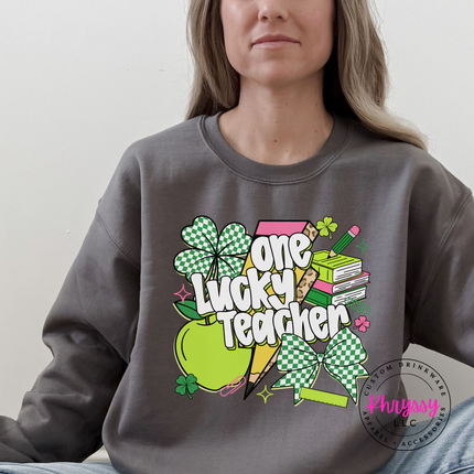 Charcoal crewneck sweatshirt with a colorful one lucky teacher shamrock print.