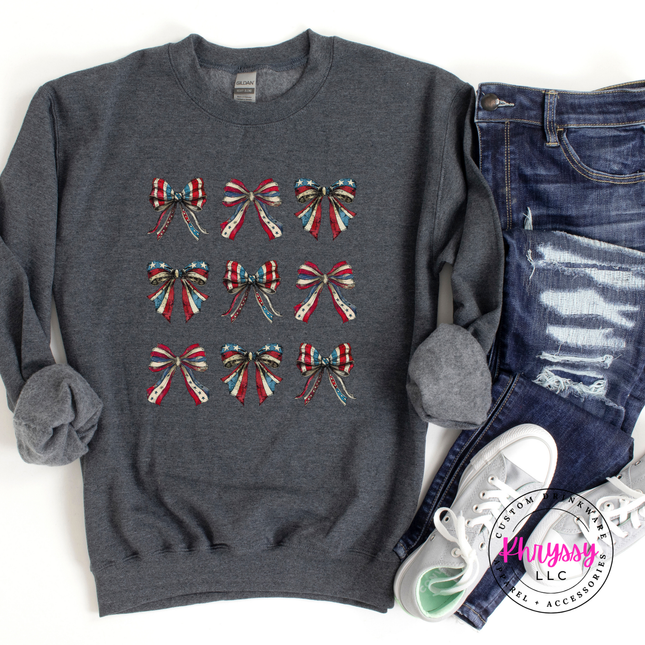 Dark Heather crewneck sweatshirt featuring a vintage red-white-and-blue flag-bow design.