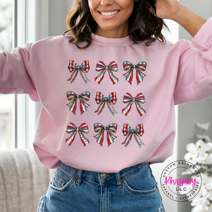 Light Pink crewneck sweatshirt with a grid of vintage American flag bows.