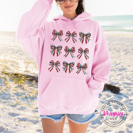 Light Pink crewneck sweatshirt with a grid of vintage American flag bows.