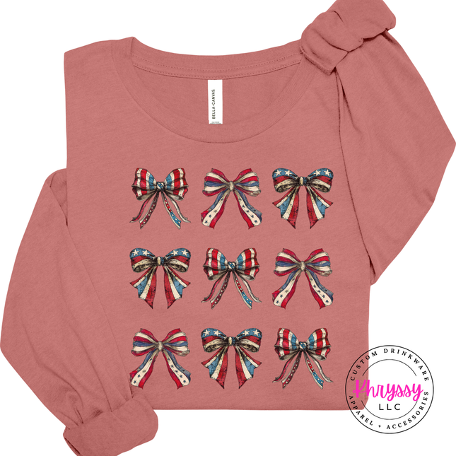Mauve long sleeve tee showing a coquette patriotic flag-bow grid print.