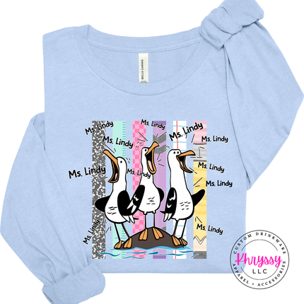 Baby Blue long sleeve tee with a personalized seagull teacher design and custom name.