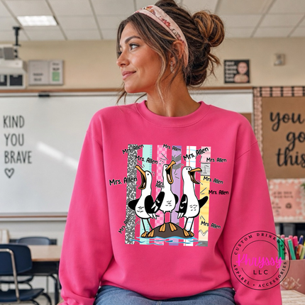 Heliconia colored crewneck featuring three cartoon seagulls shouting a custom name.