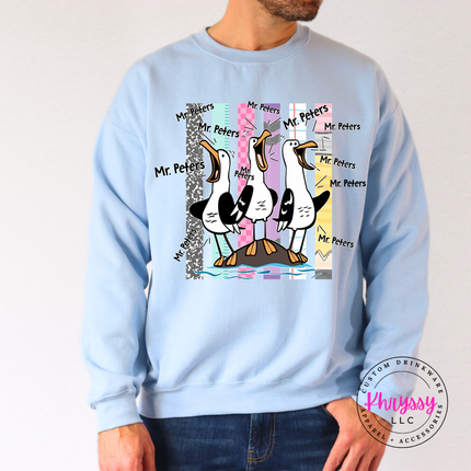 Light Blue  crewneck sweatshirt showing the custom name seagull print up close.